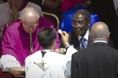 Robert Mugabe, right, at the beatification of Pope John Paul II