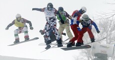 GIF: Snowboard cross race ends in dramatic crash at photo finish