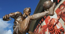 Arsenal immortalise the great Dennis Bergkamp with this statue outside the Emirates