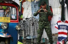 Fears of further political violence mount after two die in Bangkok grenade attack