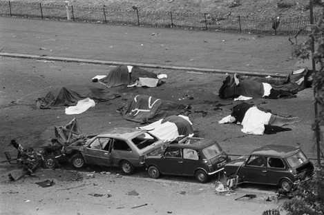 File photo dated 20/07/82 of dead horses covered up and wrecked cars at the scene after an IRA bomb exploded as the Household Cavalry was passing, in Hyde Park, London.
