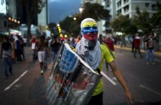 Students hit with water cannons and tear gas in Venezuela protests