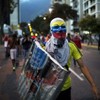 Students hit with water cannons and tear gas in Venezuela protests