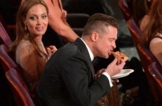 Celebrities helping themselves to the pizza Ellen ordered at the Oscars