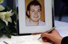 Woman held over Ronan Kerr murder