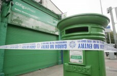 Armed raiders threatened staff during post office robbery