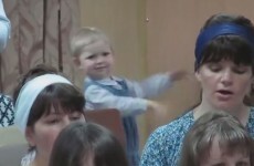 Baby conducts church choir and gets really, really into it