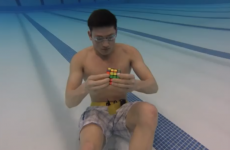 This lad can solve three Rubik's Cubes under water in 60 seconds