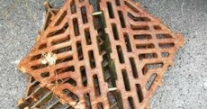 Two arrested for theft of 15 manhole covers