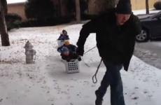 Greatest dad ever takes kids on washing basket sleigh ride
