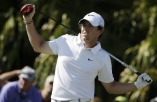 Four share lead at windy WGC, as Rory McIlroy lurks