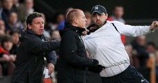 Man charged over mid-match assault on Neil Lennon