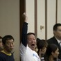 "Tell us the truth!" Police intervene as families of missing passengers confront officials