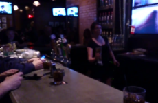 Bartender throws a full pint across the pub without spilling it