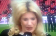 German sideline reporter hit on the head by football... again