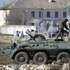Outnumbered: Ukrainian troops withdraw from Crimea
