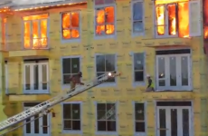 Unbelievable footage shows construction worker's lucky rescue from raging fire