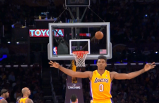 A perfect picture of Nick Young celebrating a three-point shot that didn't go in