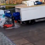 Blundering forklift driver accidentally pours crate of fish over his own head