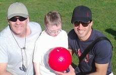 Luis Suarez stops for kickabout with young boy with Down Syndrome