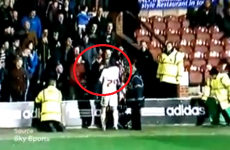 Crawley player gives a fan in the stands a clip around the ear