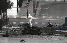 Booby-trapped car explodes outside bank in Athens