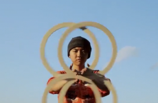 This hoop juggler's magical moves are hypnotic