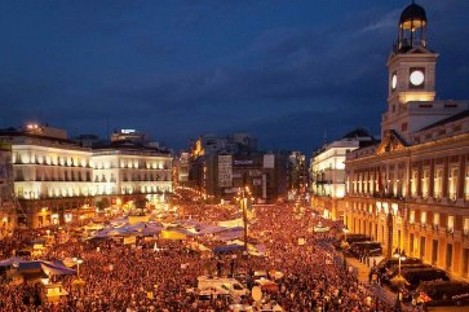 Tens of thousands of people take part in a demonstration in Madrid, Saturday, May 21, 2011.