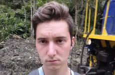 Man attempts to a take selfie with a passing train