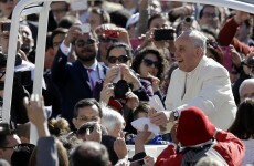 Pope Francis gives two kids a lift on the PopeMobile and has the craic with them