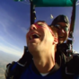 This man is REALLY not enjoying his skydive