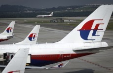 Malaysia Airlines flight makes safe emergency landing after a landing gear failure
