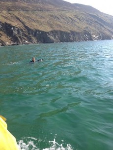 How did you spend Easter morning? This man towed a stranded dolphin back to the depths off Achill