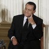 Egypt's Mubarak and two sons charged over protest deaths