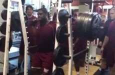A college football lineman squats 810 pounds with perfect form