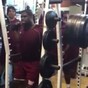 A college football lineman squats 810 pounds with perfect form