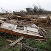 Violent storms kill 13 people across central United States