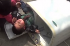 Little boy rescued after getting stuck in washing machine
