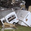 "It's chaos": At least 10 killed as powerful tornadoes tear across southern US