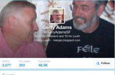 Who has been using Gerry Adams's Twitter account while he's been under arrest?