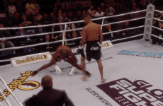 KO'ed kickboxer does the splits after roundhouse blow to the chest