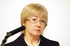 Fianna Fáil TD hopes Hanafin doesn't fall off her ladder as she erects posters in Blackrock