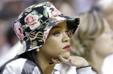 Having fun? Rihanna watches Miami Heat masterclass in how to kill a tight game