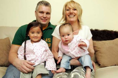 Derek and Ursula Hickey who adopted Mia (left) and Abi from Vietnam (File photo, 2005)
