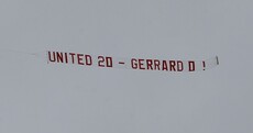 Man Utd fans fly banner mocking Steven Gerrard over Anfield
