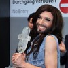 Conchita vows to fight for tolerance, as thousands turn out for Austria homecoming