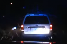 Unbelievable dash-cam footage shows tree falling on unlucky traffic cop