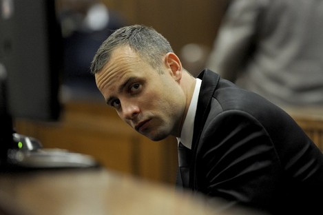 Oscar Pistorius sits in court for his ongoing murder trial in Pretoria.