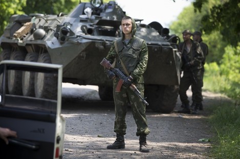 Ukrainian government soldiers guard a checkpoint near Kramatorsk, eastern Ukraine.