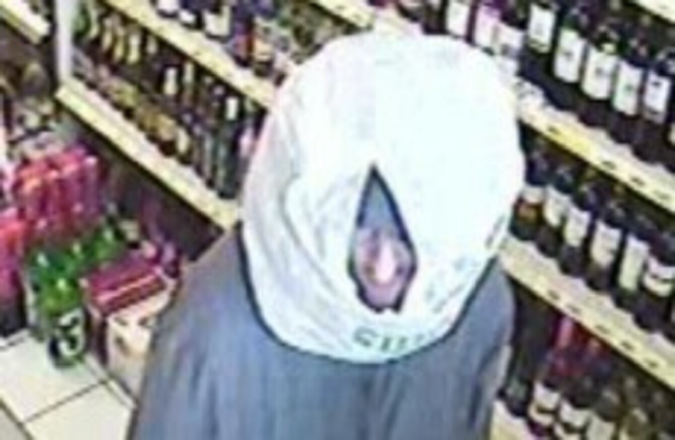 Man robs shop while wearing a plastic bag on his head ...